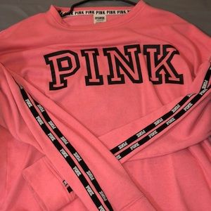 A pink sweat shirt